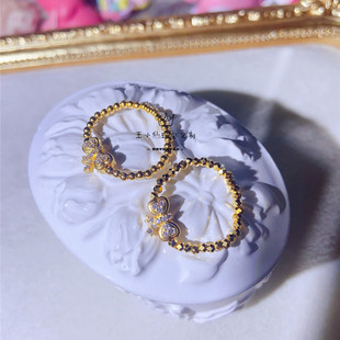 足金点钻工艺莫桑双面蝴蝶结2mm小金珠圆珠镭射蹦迪珠弹力绳戒指