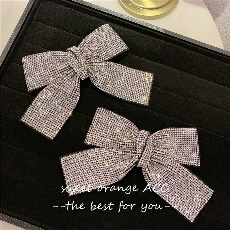 立体超闪少女风边夹满钻蝴蝶结