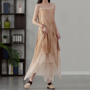 棉麻连衣裙女夏新款海边度假旅拍不规则飘逸大摆裙喷染打底吊带裙