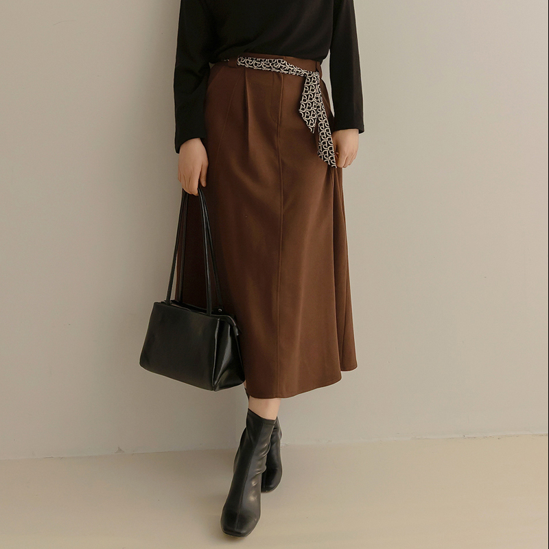 韩国代购大码女装2025靓丽冬装新款系扣后松紧显瘦百褶气质半身裙