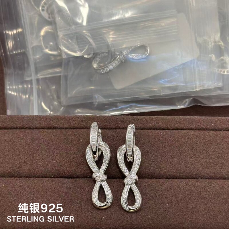 通体s925轻奢时尚8字蝴蝶结满钻耳环耳钉两种戴法感闪钻丝带