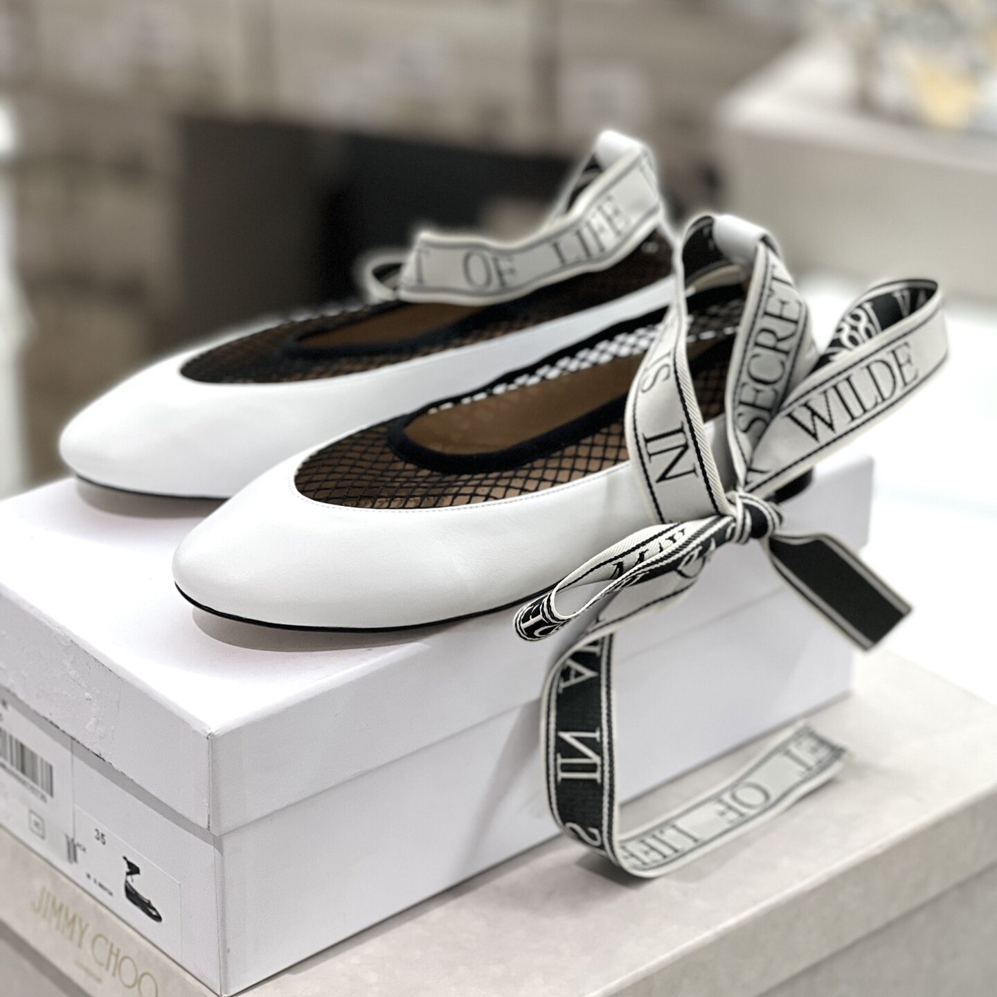JW ANDERSON 潮流时尚字母绑带芭蕾舞鞋浅口鞋银泰百货 301596
