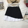 Nana same paragraph black and white Hit color False two skirt temperament Paige Pleated skirt Versatile Skirt