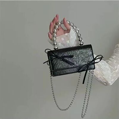 uustudio原创小众设计师包包女2025新款迷你蝴蝶结链条手机