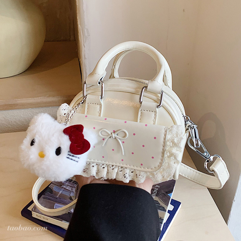 可爱少女手提保龄球包2026新款迷你百搭斜挎包超火小众波点枕头包