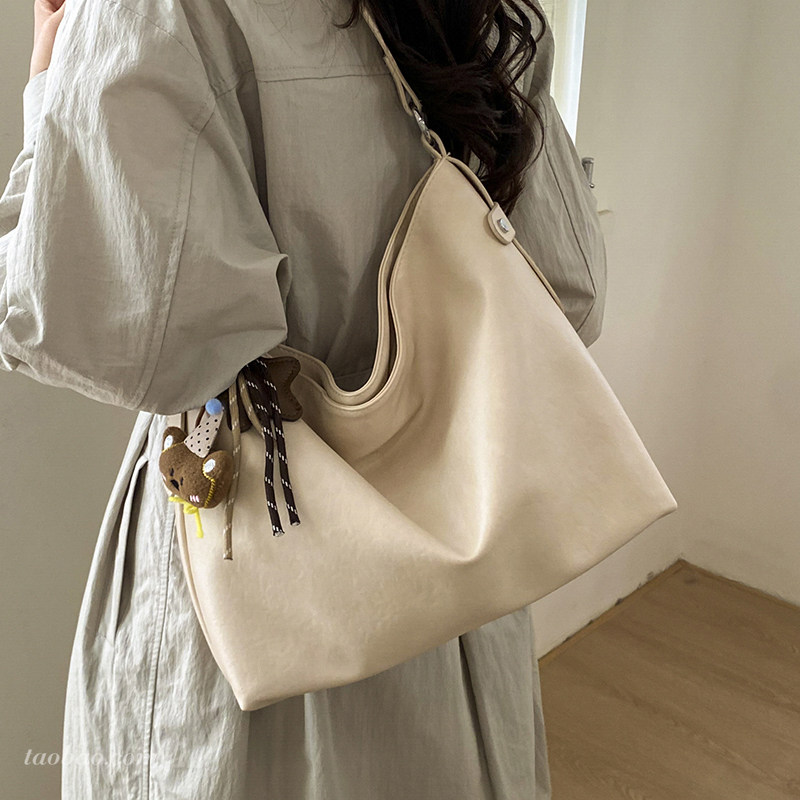 时尚简约大容量包包2026新款通勤百搭女士单肩斜挎包大学生托特包
