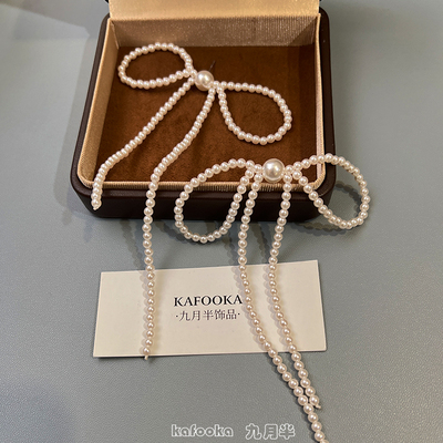 施家珍珠串珠蝴蝶结流苏耳环耳夹