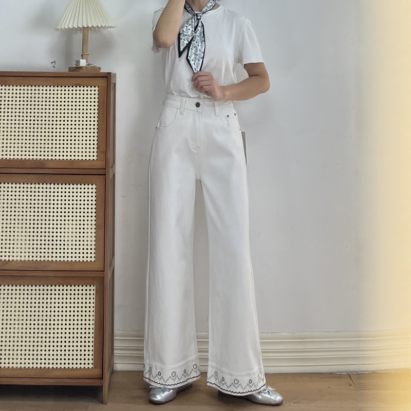 四面弹米白色民族风阔腿牛仔裤女
