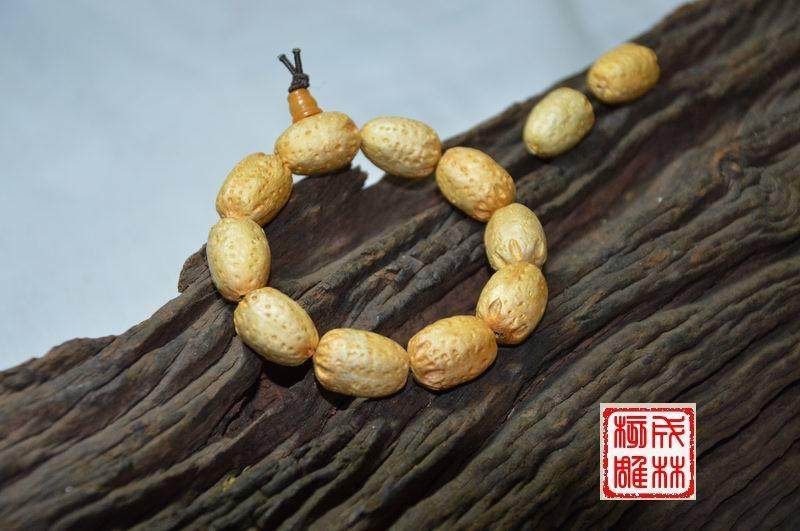 五眼六通菩提子手串 金黄色手工制作 山菠萝滴血莲花 橄榄核雕