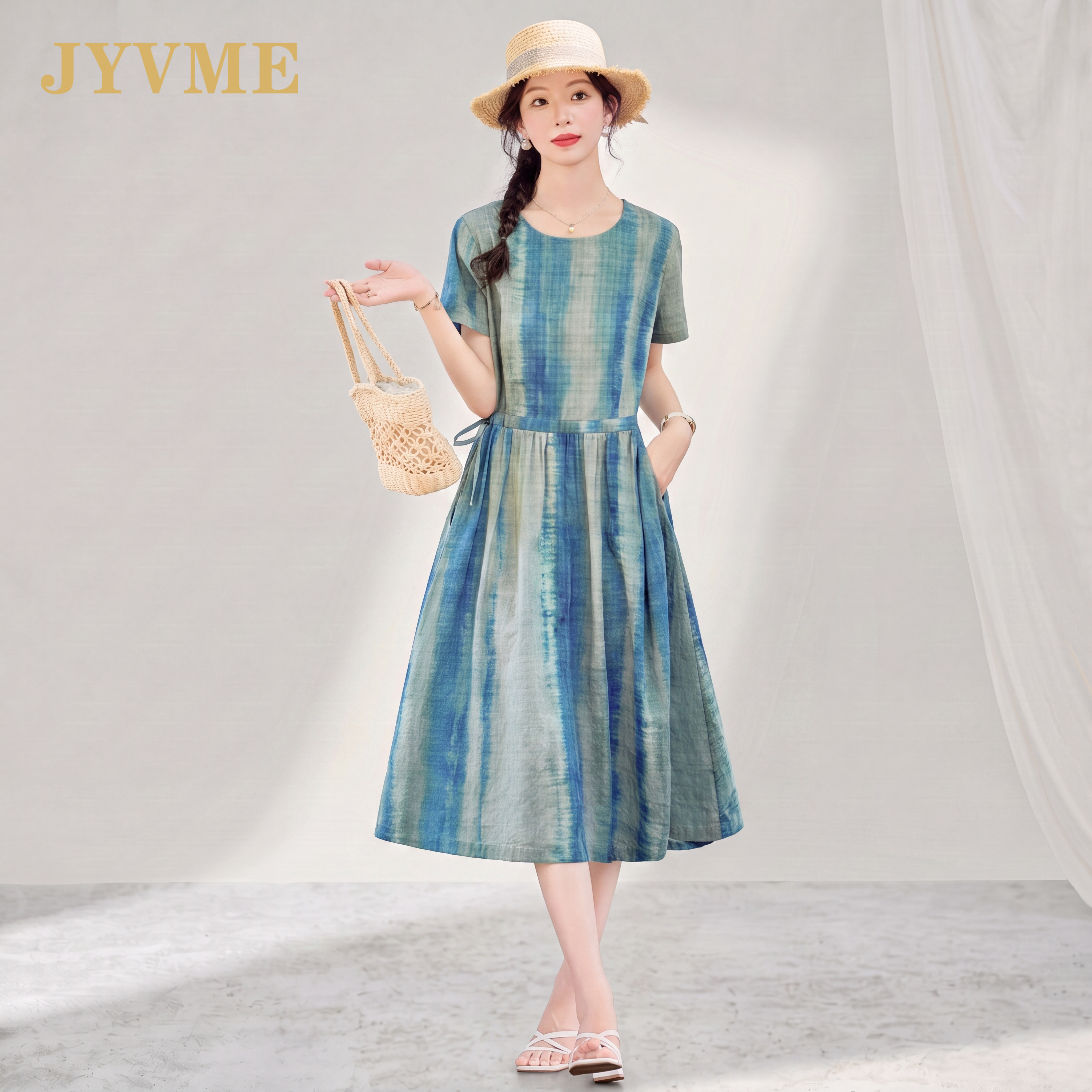 JyVme轻奢蓝色条纹印花连衣裙女2026新款夏装度假气质休闲裙子棉