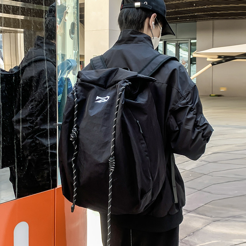 学生大容量休闲背包书包男包