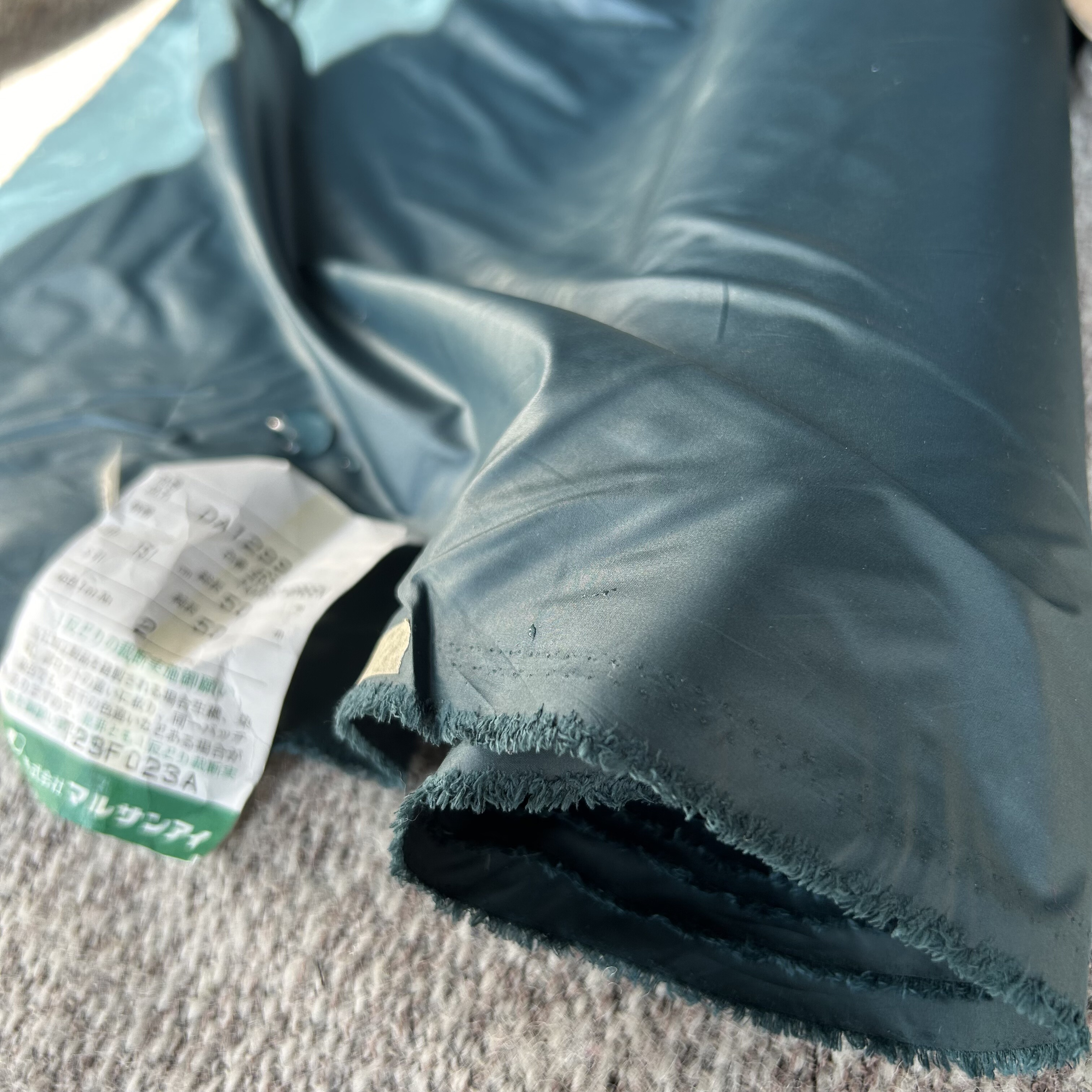 日本进口墨绿色高密度泡芙羽绒服面料防绒防水防风轻薄布料一米价