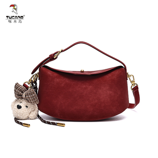 TUCANO啄木鸟2026新款 女包真皮牛皮饺子包质感锁扣斜挎包