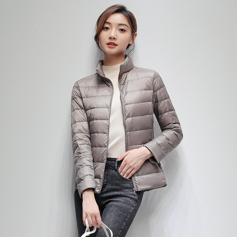 唯品会特卖断码清仓特价处理轻薄白鸭绒羽绒服女装品牌正品春秋冬