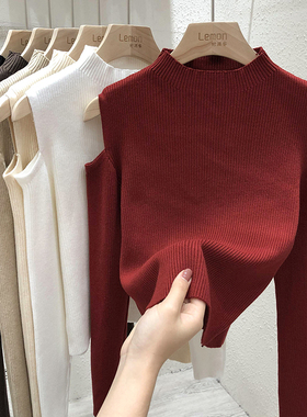 2025早春毛衣女洋气露肩上衣高腰设计感小众短款黑色打底衫针织衫