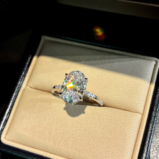 轻奢简约鸽子蛋钻戒925银椭圆形人造仿真钻钻石戒指女求婚巨闪耀