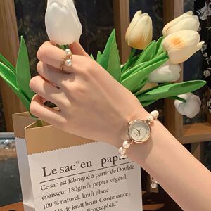 金米欧手表女珍珠粉水晶饰品拉链轻奢小众小巧表盘精致女生表