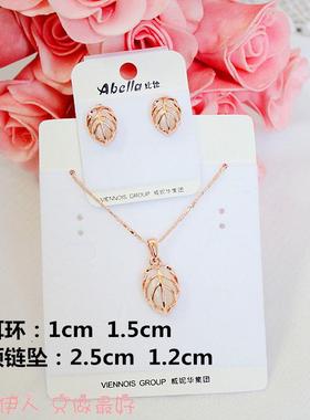 玫瑰金仿猫眼石镂空树叶耳钉短链