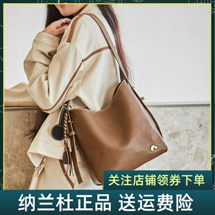 纳兰杜晚霞包包女式2026新款棕色水桶包大容量植鞣通勤斜挎包女包