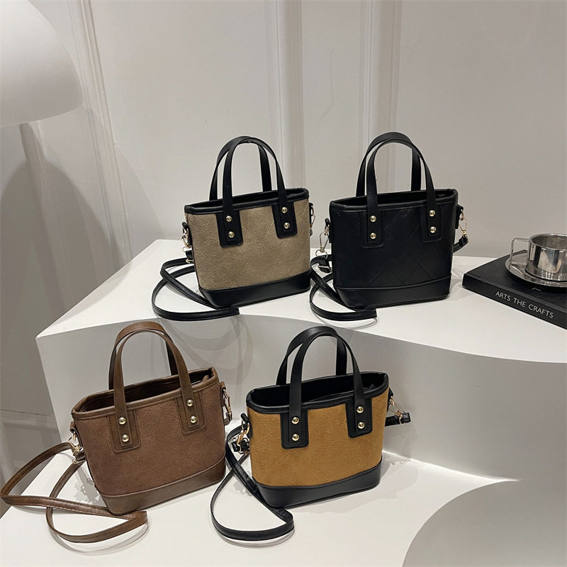 简约潮手提包简约水桶包女2026秋季新款复古单肩包休闲通勤斜挎包