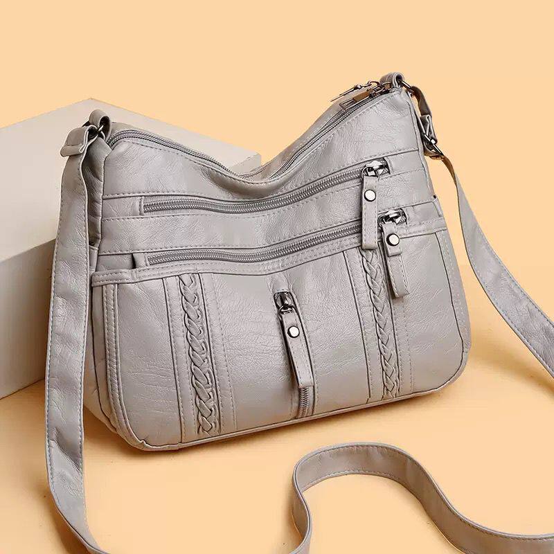 新品时尚编织简约个性通勤柔软单肩斜跨包pu女包时尚百搭背包托特