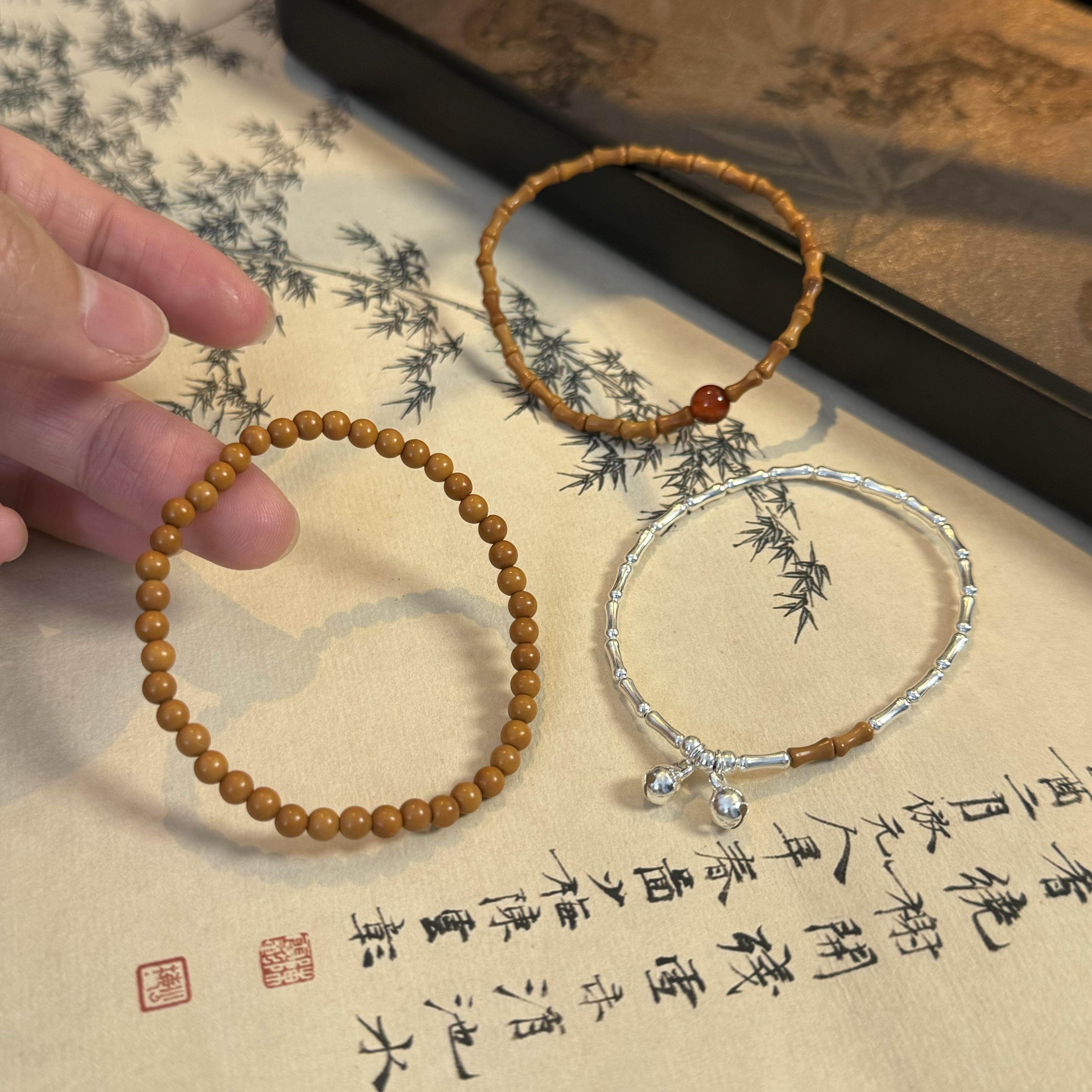 橄榄核玛瑙铃铛竹节天然静心盘玩手链精致mini手串