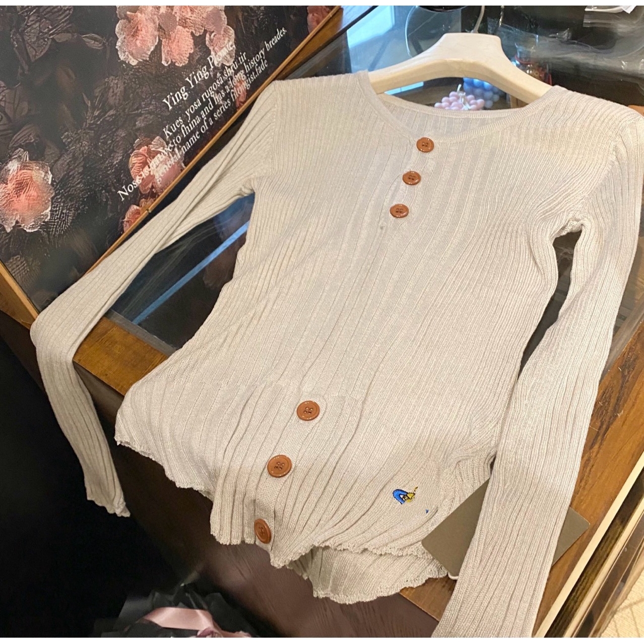 2025西太后土星高版早秋新款别致刺绣不规则针织衫女秋季修身圆领