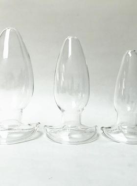 A self-pleasuring toy made of glass for use inside the anus.