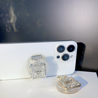 气囊手机支架水钻香水瓶伸缩指环扣创意女粘贴式懒人追剧神气桌面