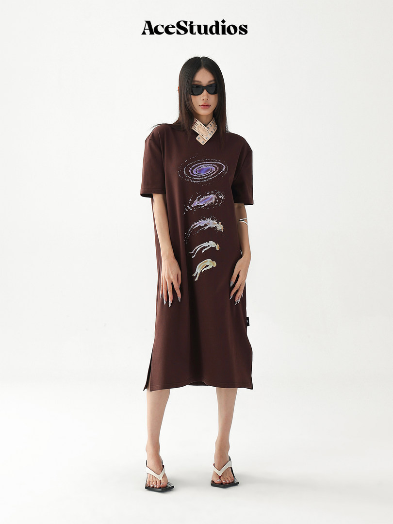 Model wearing a brown graphic oversized dress with short sleeves