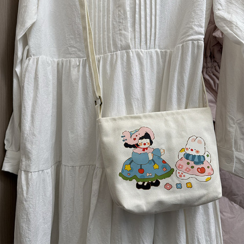 日韩卡通帆布袋斜跨女小号手机包