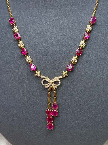18k金镶天然红宝石项链主石：6.00ct  总重：6.91g   钻石：52颗