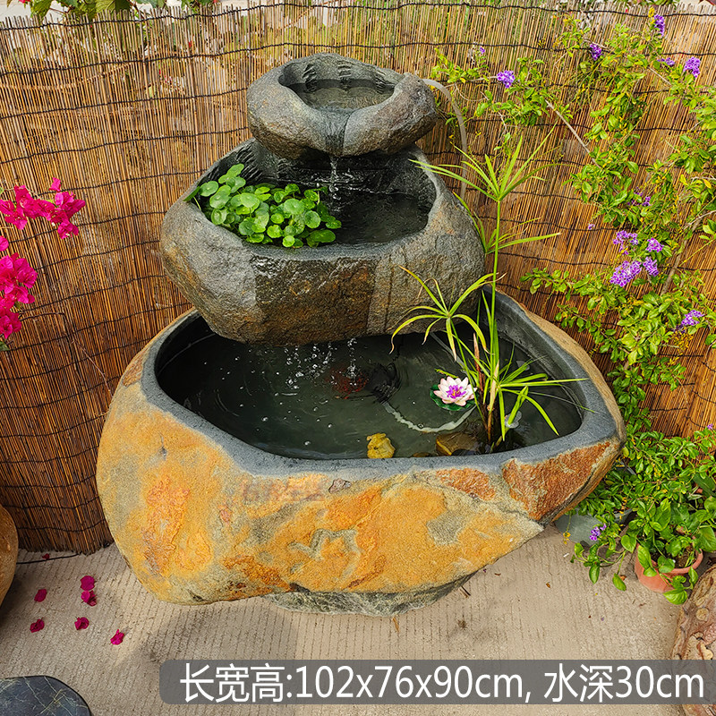 花园原始自然石头流水鱼缸水景