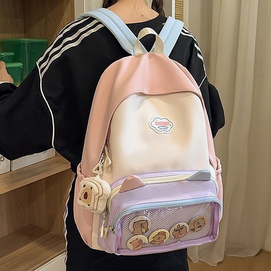 书包初中女生新款高颜值甜美学院风吧唧痛包高中生轻便旅行大容量