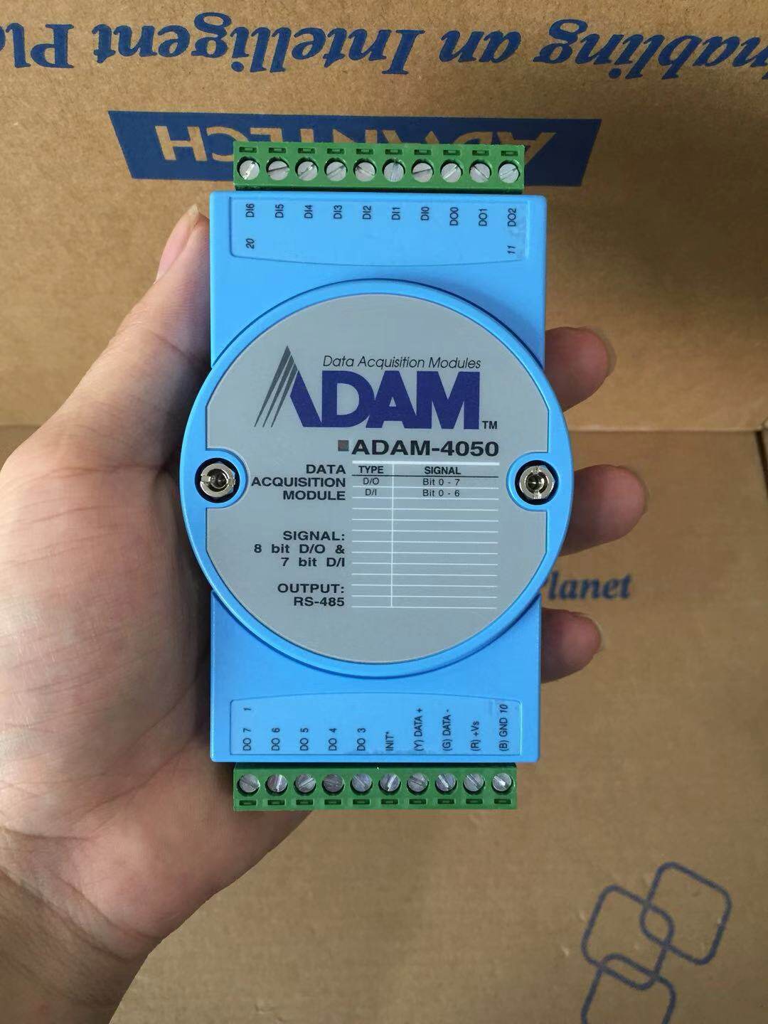 ADVANTECHS ADAM-4050-DE DIGITAL IO MODULE HAS 7 INPUTS AND 8 OUTPUTS A BUILT-IN WATCHDOG TIMER