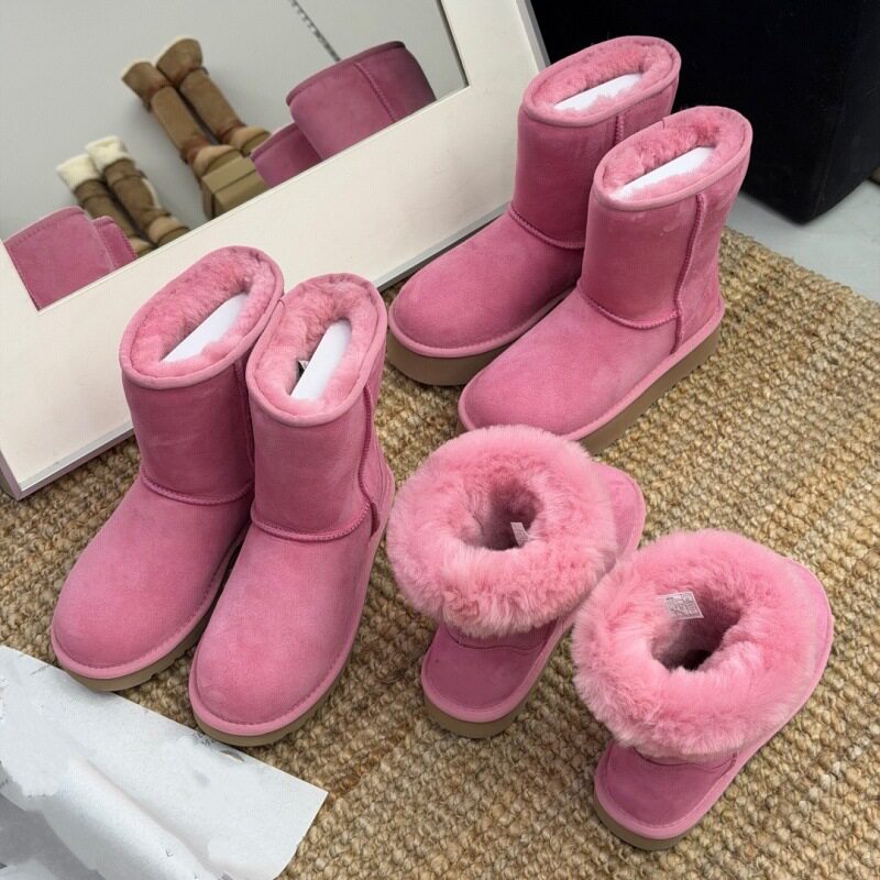羊皮毛一体粉色雪地靴女2025冬季新款厚绒保暖东北棉靴平底短筒靴