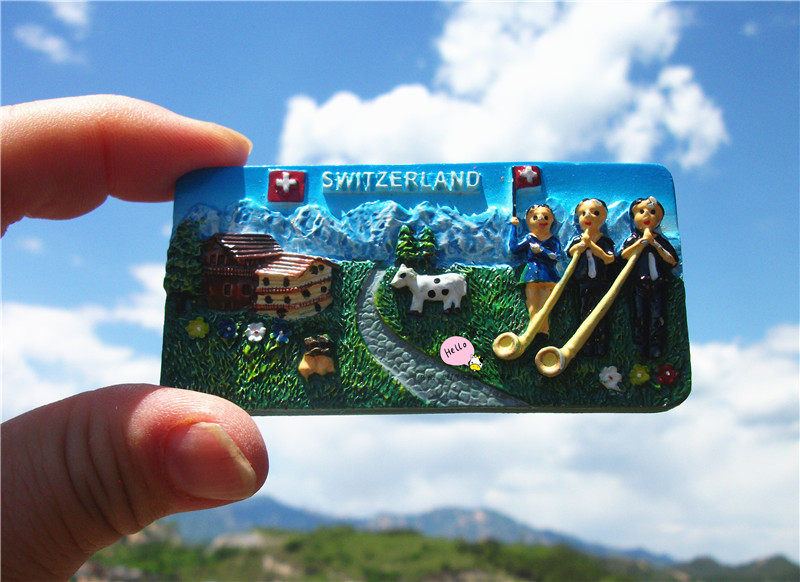 SWITZERLAND LOCAL PURCHASE OF REFRIGERATOR MAGNETS SWITZERLAND SNOW MOUNTAIN SCENERY ALPINE TROMBONE TWO MODELS