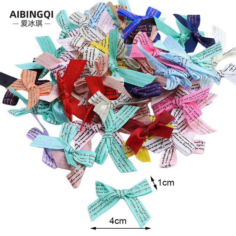 50个混色外文涤纶丝带手打结成品蝴蝶结礼品包装服饰发卡材料