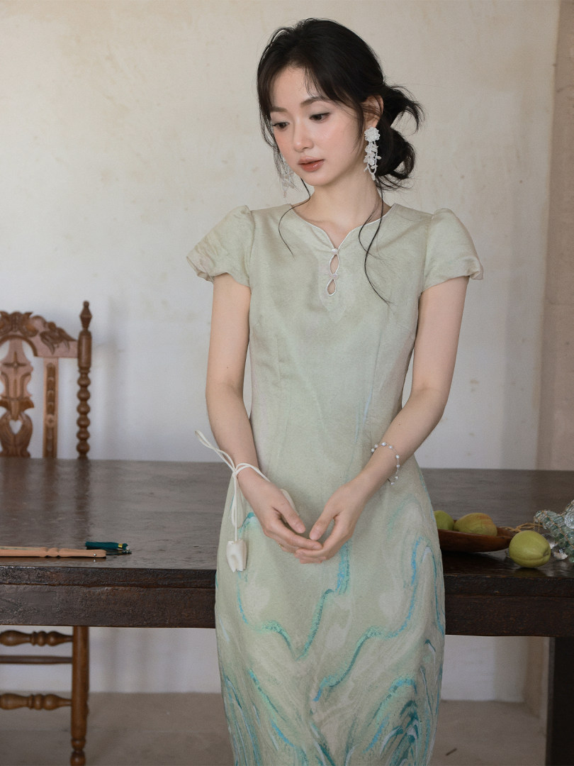 Light green floral dress worn by a model