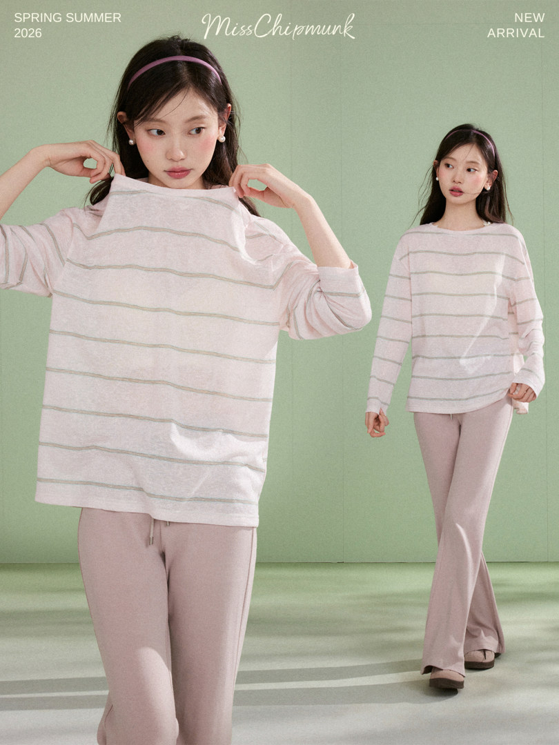 Model wearing a light pink striped long-sleeve top and matching pants