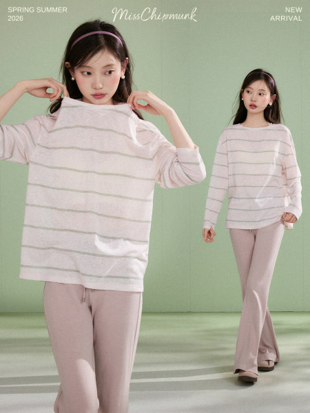 Model wearing a light pink striped long-sleeve top and matching pants