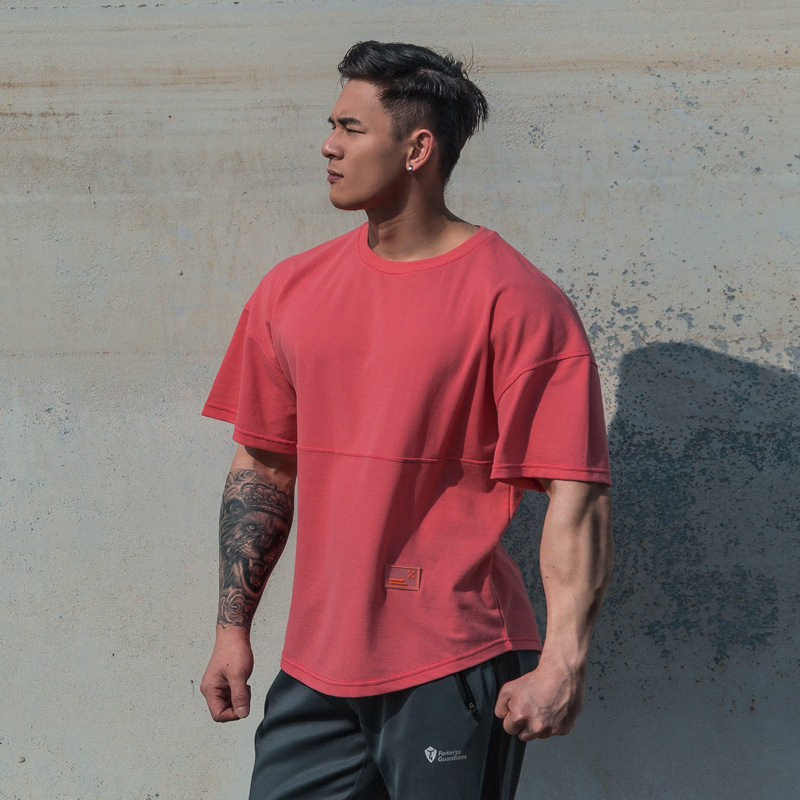 FITNESS BODYBUILDING SOLID COLOR LOOSE COTTON SHORT SLEEVES EUROPEAN SIZE IS ON THE LARGE SIDE