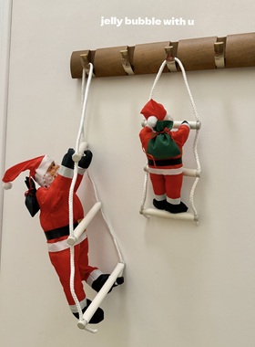 爬梯的圣诞老人橱窗窗户