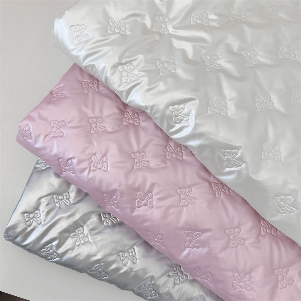 布亦 新款绗缝pu皮革ins风可爱蝴蝶结夹棉羽绒服内胆棉服马甲面料