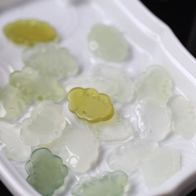 祥云岫玉间饰流苏禁步花影耳环