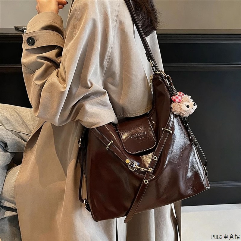 南木熊包包女大容量韩版休闲斜揹包百搭通勤双肩包多功能日常学生