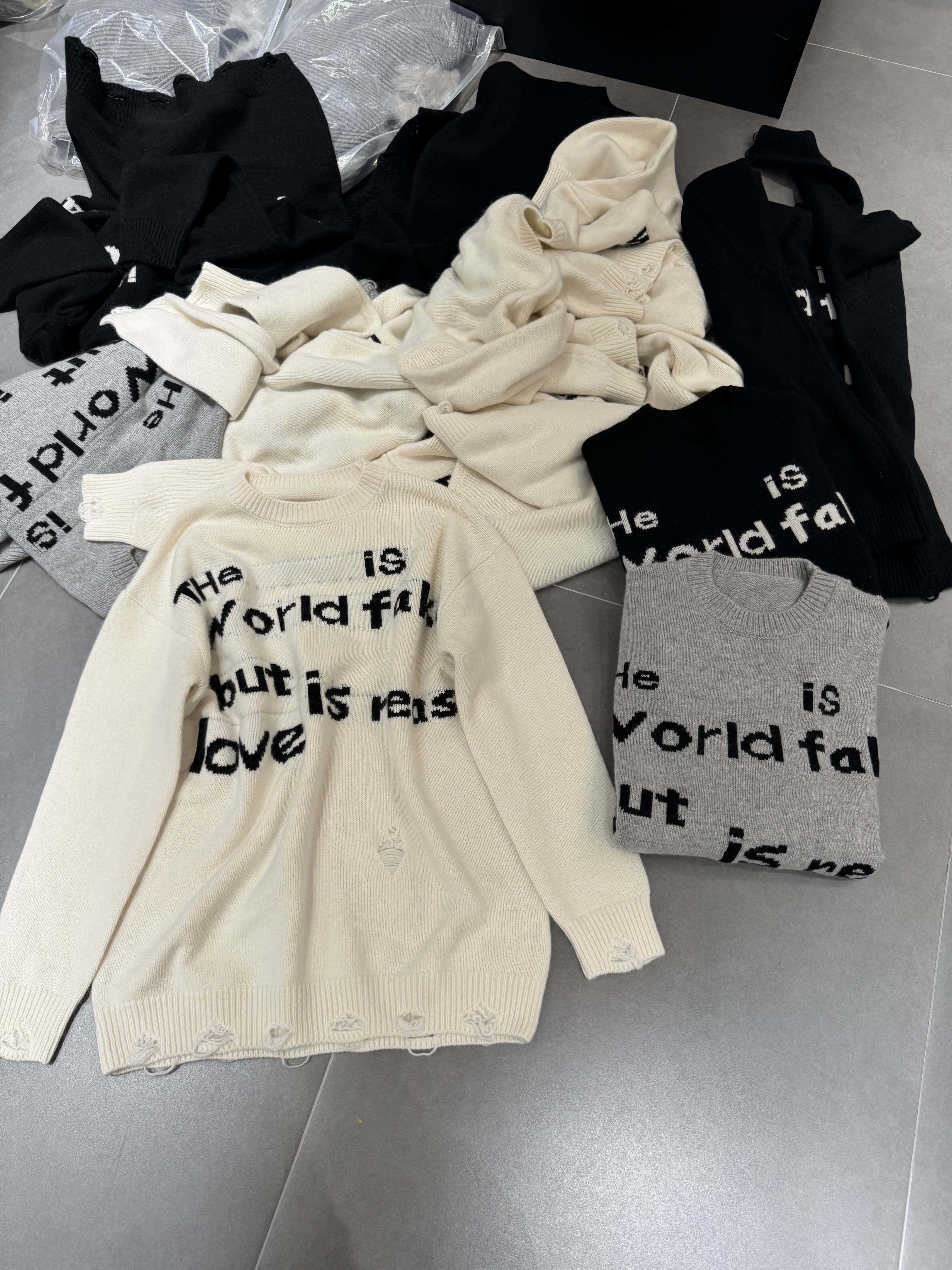 欧洲站2025冬季新款欧货时尚圆领字母印花宽松慵懒风百搭羊毛上衣