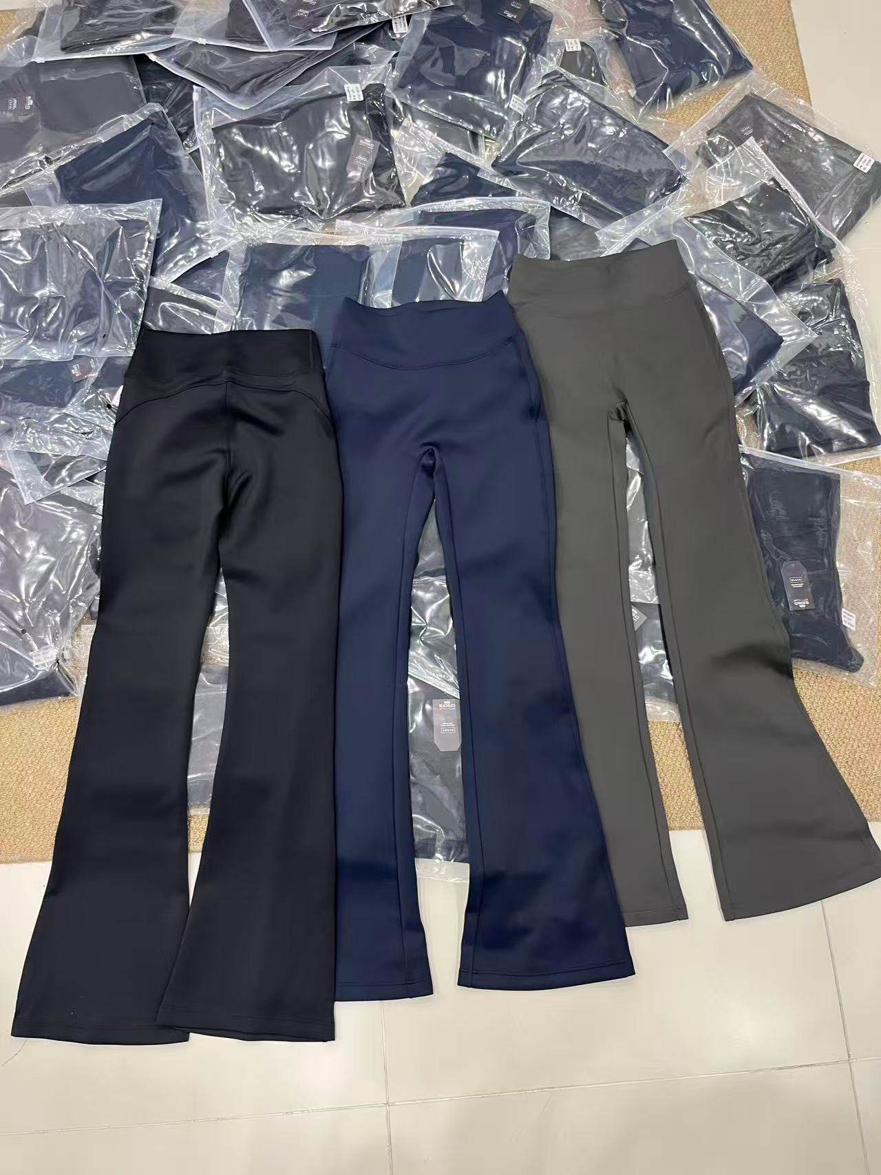 欧洲站2026秋冬新款欧货简约纯色显瘦百搭弹力修身微喇打底裤女