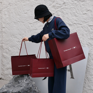 高档覆膜纸袋子手提袋服装店打包衣服袋子定制logo安可拉红手提袋