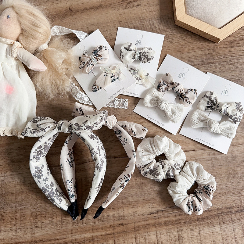 新款日系碎花淑女甜美珍珠蝴蝶结